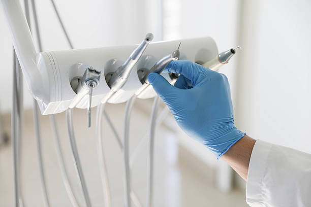 Professional Tooth Extraction technician working in Pacific Grove, CA